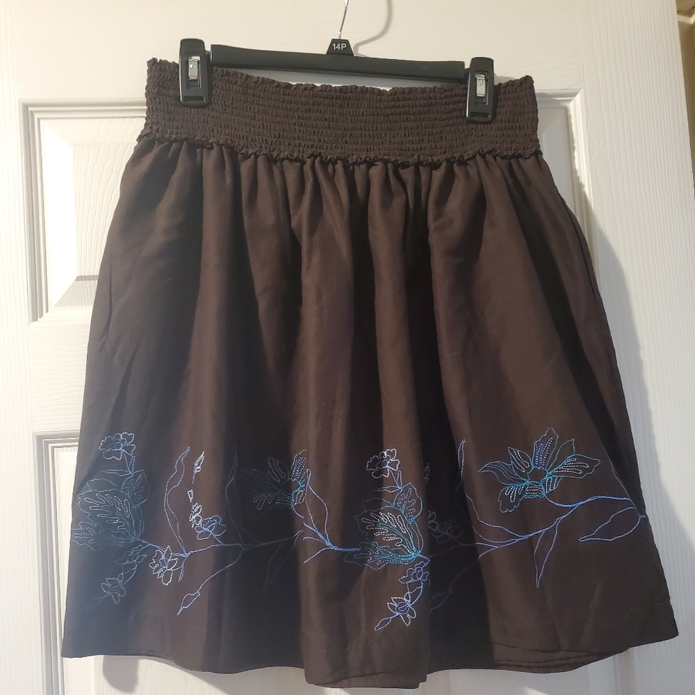 Brown skirt with stitched flower designs